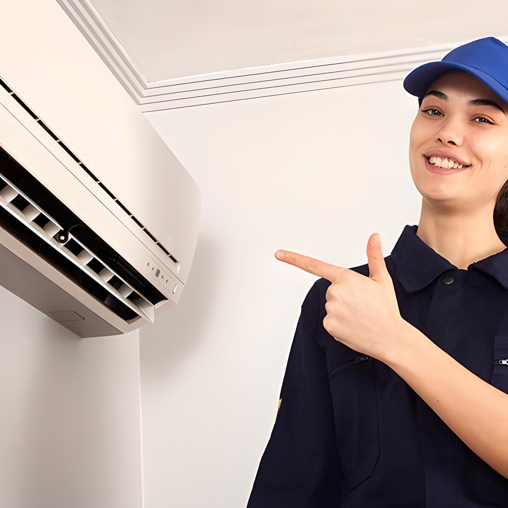 woman pointing at an air conditioner